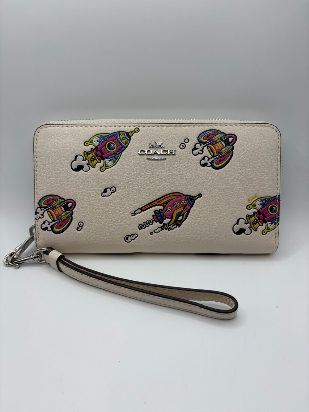 Coach Cream Zip-Around Wristlet with Colorful Space Rocket Print